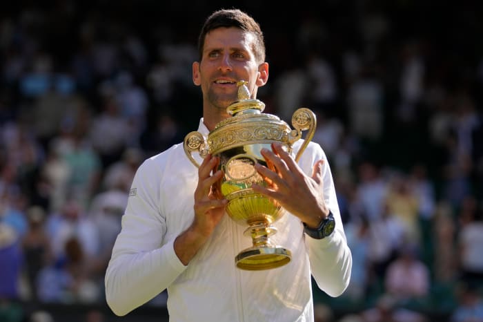 Novak Djokovic celebrates his latest Wimbledon win.